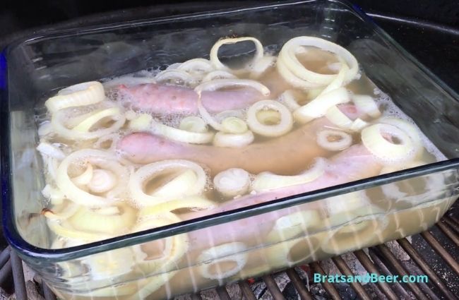 Brats Boiling in Beer and Onion