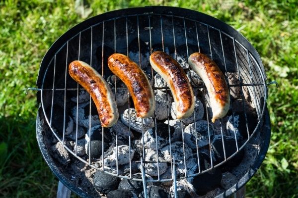 Bratwurst on gas outlet grill